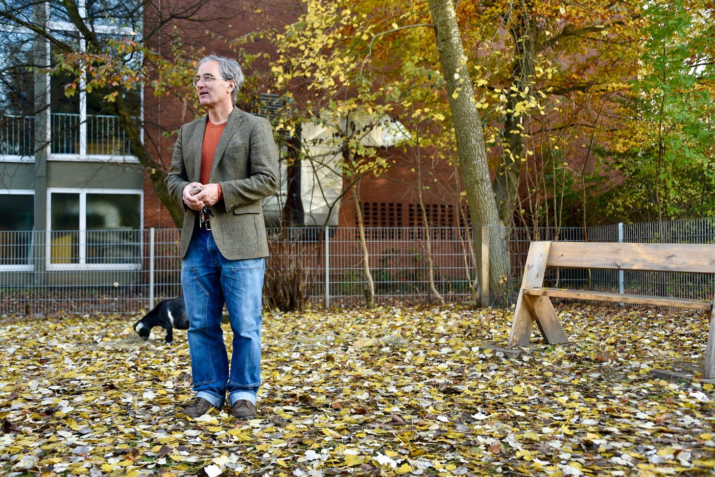 Headmaster Jochen Grob in the goat enclosure of the all-day school